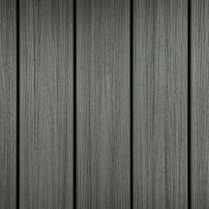 This image features a close-up view of vertically aligned gray wooden planks. The wood grain is clearly visible, giving the surface a natural and rustic appearance. The setting is neutral, making it suitable for use as a background or texture in various design projects. The overall mood is calm and understated, with a cool-toned color palette.