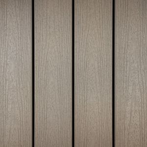 The image shows a close-up view of five vertical wooden planks with a light brown, natural grain texture. The planks are evenly spaced, creating dark lines between each board. The setting appears to be a wall or floor surface, with a neutral and minimalistic visual style. No visible text, numbers, or logos are present in the image.