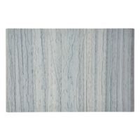 The image shows a rectangular object featuring a light blue and gray wood grain texture. The surface appears flat and smooth, resembling a wooden panel or decorative board. The vertical grain lines create a natural, organic pattern, and the overall palette is cool and muted. No visible text, numbers, or logos are present.