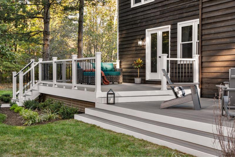 Trex Enhance deck with white railing, fascia and steps