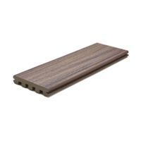 A single composite decking board is displayed against a white background. The board features a realistic wood grain pattern and a grooved edge, suggesting suitability for outdoor flooring or decking installations. The color palette includes natural brown and taupe tones, and the board's hollow core construction is visible from the side.