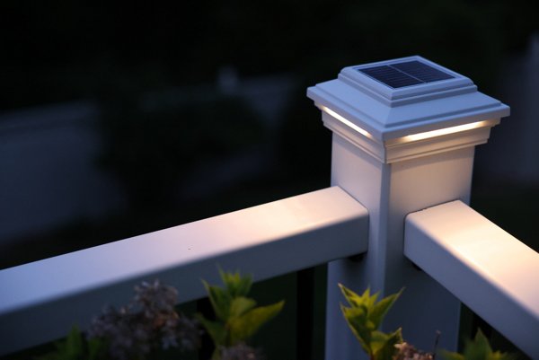 Solar lights illuminating a patio and landscaping