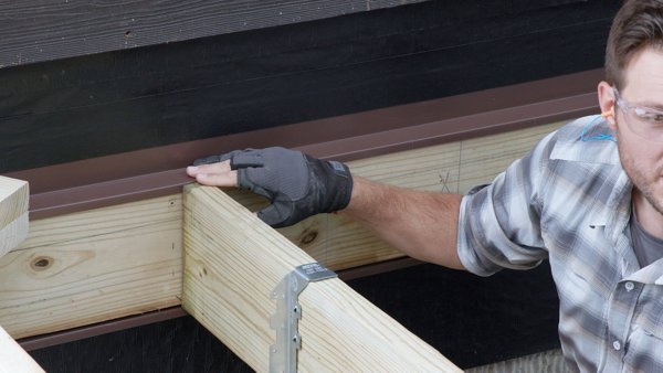top of joist is flush with ledger board