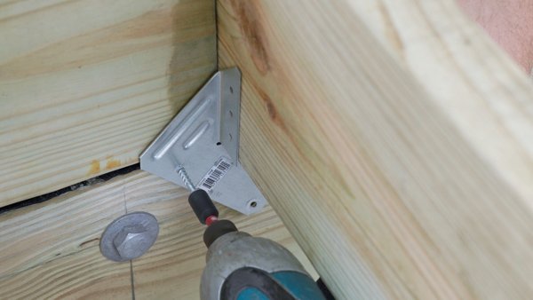 screwing hurricane tie to bottom of joist