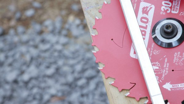 setting the depth of the saw blade to thickness of material