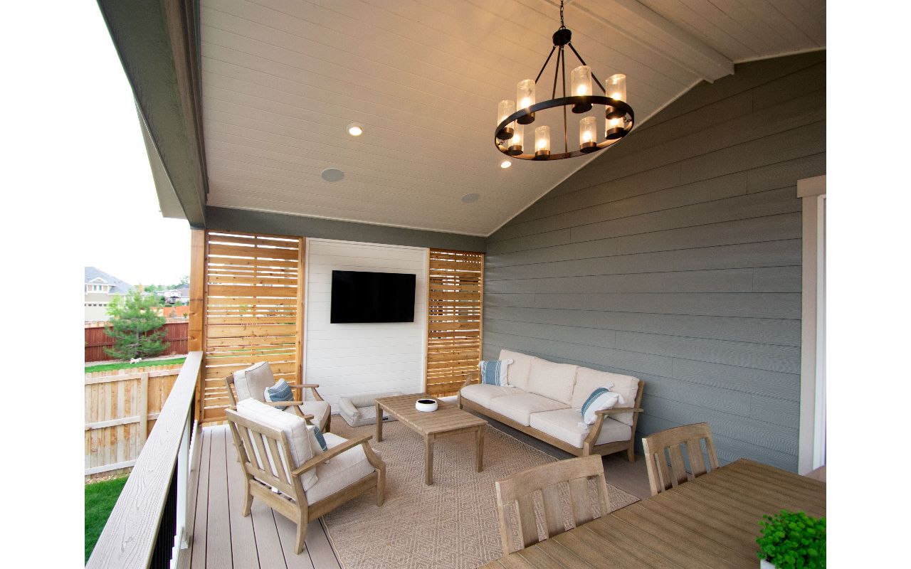 Parker, CO Trex Transcend deck and railing with privacy wall and patio cover