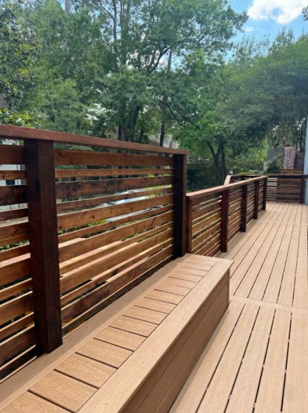 Modern composite deck with cedar privacy screen and built-in bench. A functional and private outdoor space designed for comfort and long-term performance in Houston weather.