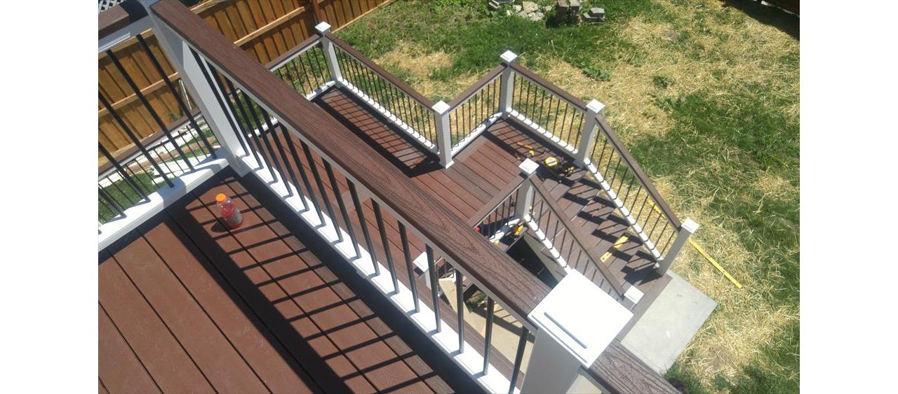 Riverview Park Alton, IL Trex Decking in Fire Pit &amp; Lava Rock - Transcend Railing w Cocktail Rail - View from Top Balcony