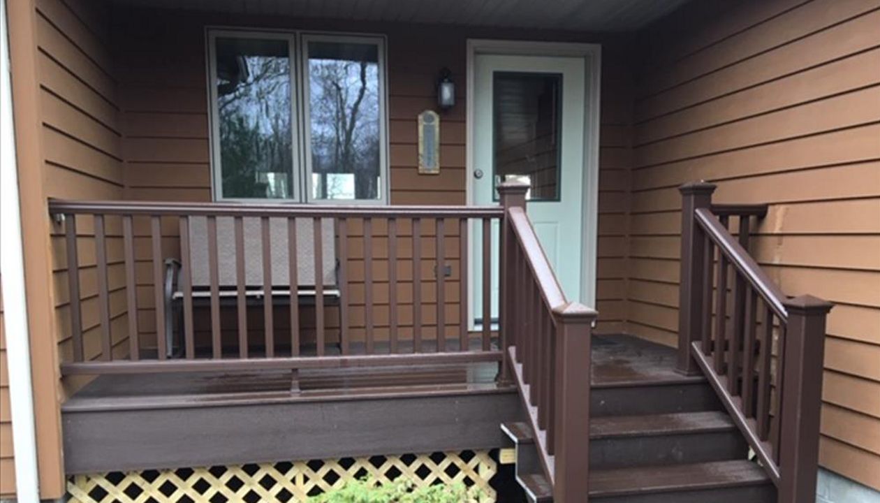 Trex Transcend Low Maintenance Composite Decking and Railing on Porch/Deck in Northern Minnesota Lake Country