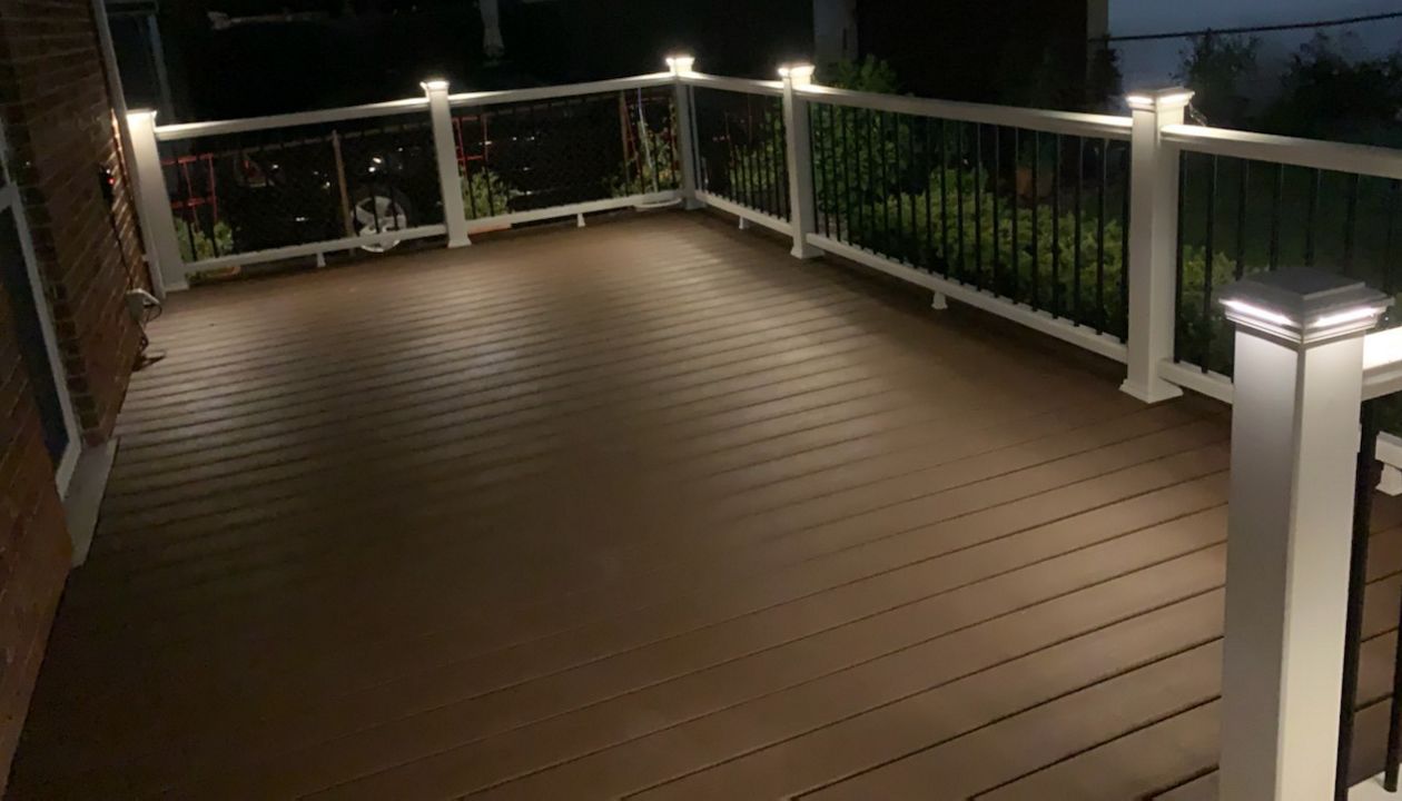 Trex Enhance Saddle deck with Trex composite railing & LED cap lights
