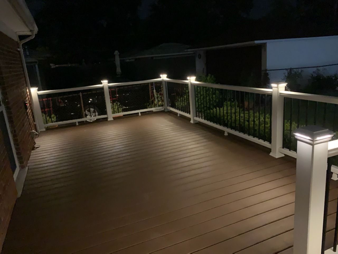 Trex Enhance Saddle deck with Trex composite railing & LED cap lights