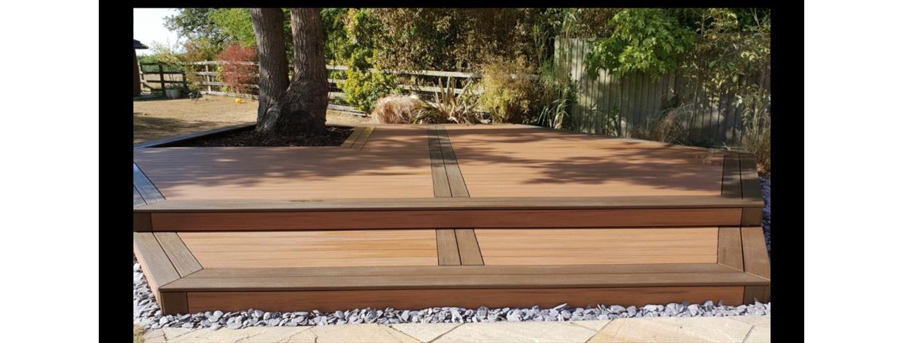 Trex Transcend composite decking in Tiki Torch with Spiced Rum border,