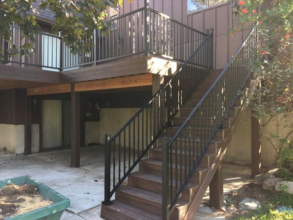 Large deck in Sandy Utah with Trex Signature railing and Trex Transcend decking.