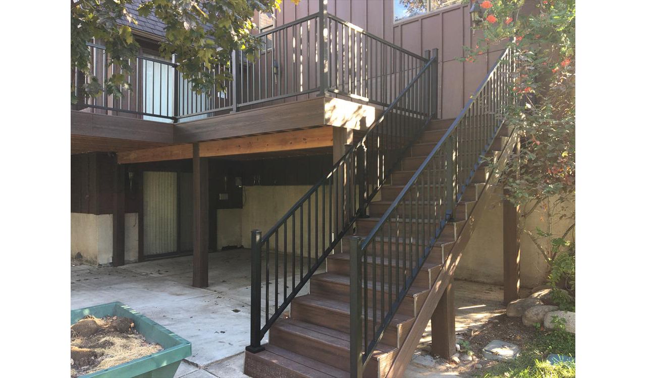 Large deck in Sandy Utah with Trex Signature railing and Trex Transcend decking.