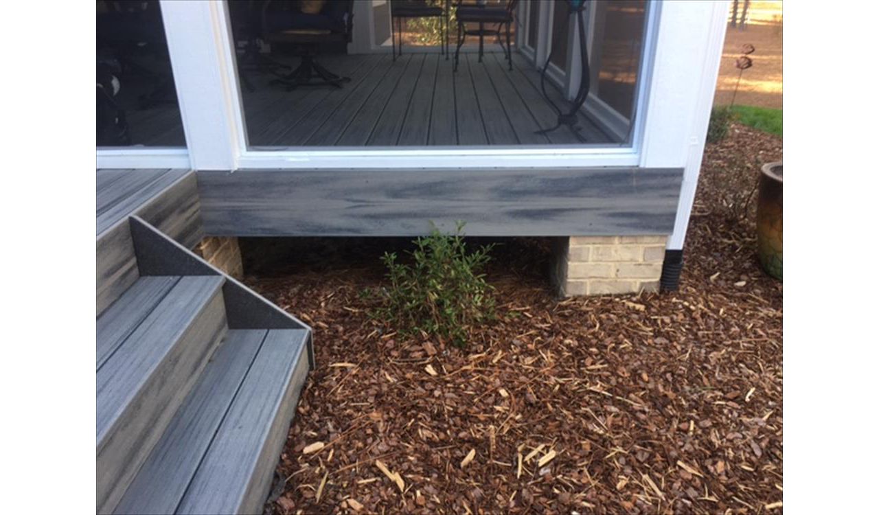 Trex Transcend Island Mist fascia finishes off the incredible deck & porch project