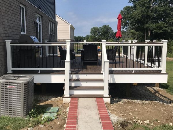 Trex Transcend Spiced Rum Deck Boards, Trex Transcent Cocktail Style Rail W/ Trex Transcend Spiced Rum 2"X4" Top Cap, Oakland, MI