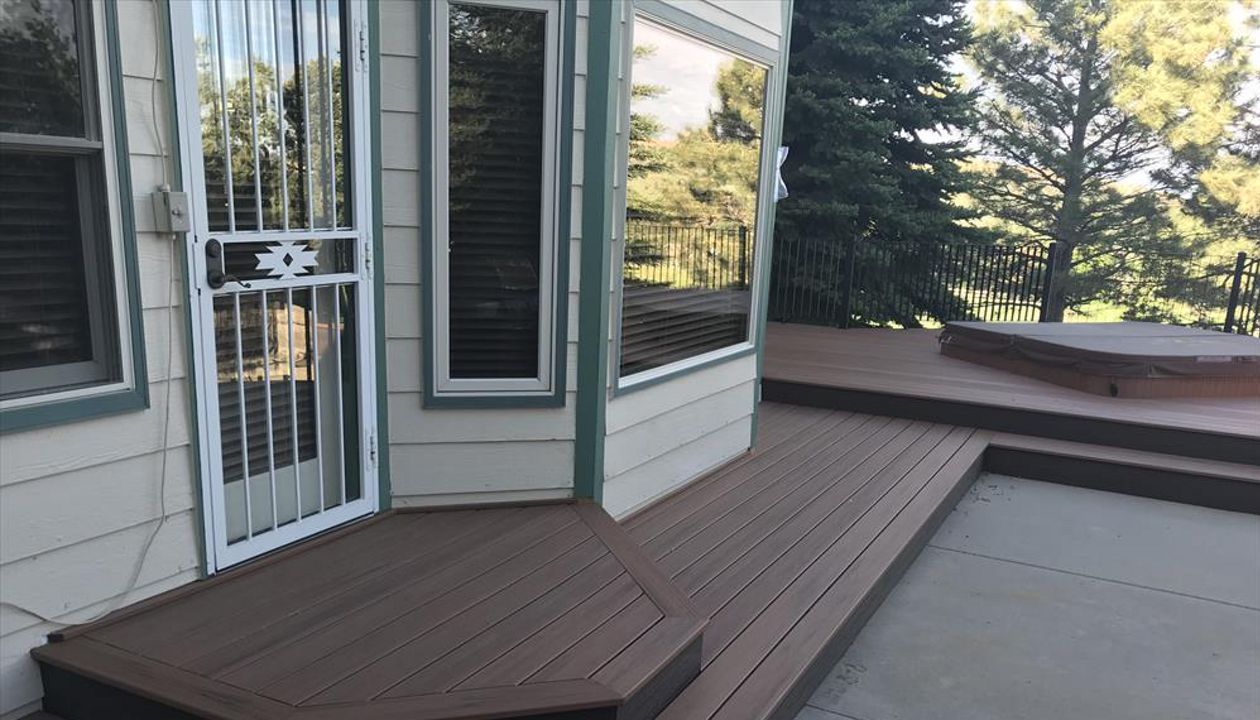 Tiki Torch decking with Lava Rock Fascia, elevation steel frame