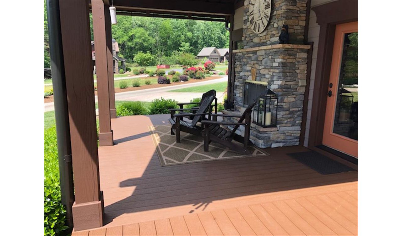 This Trex Select Saddle porch is a great place to have friends over with a cold beverage and wonderful view of Lake Lure