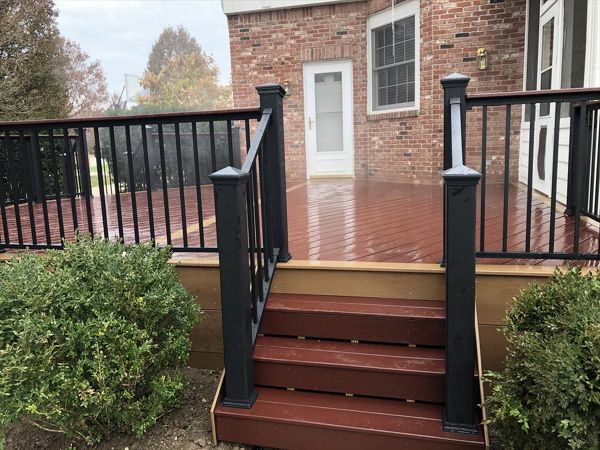 Trex Select Maderia w/ Beach Dune border. Trex Signature aluminum railing with cocktail board