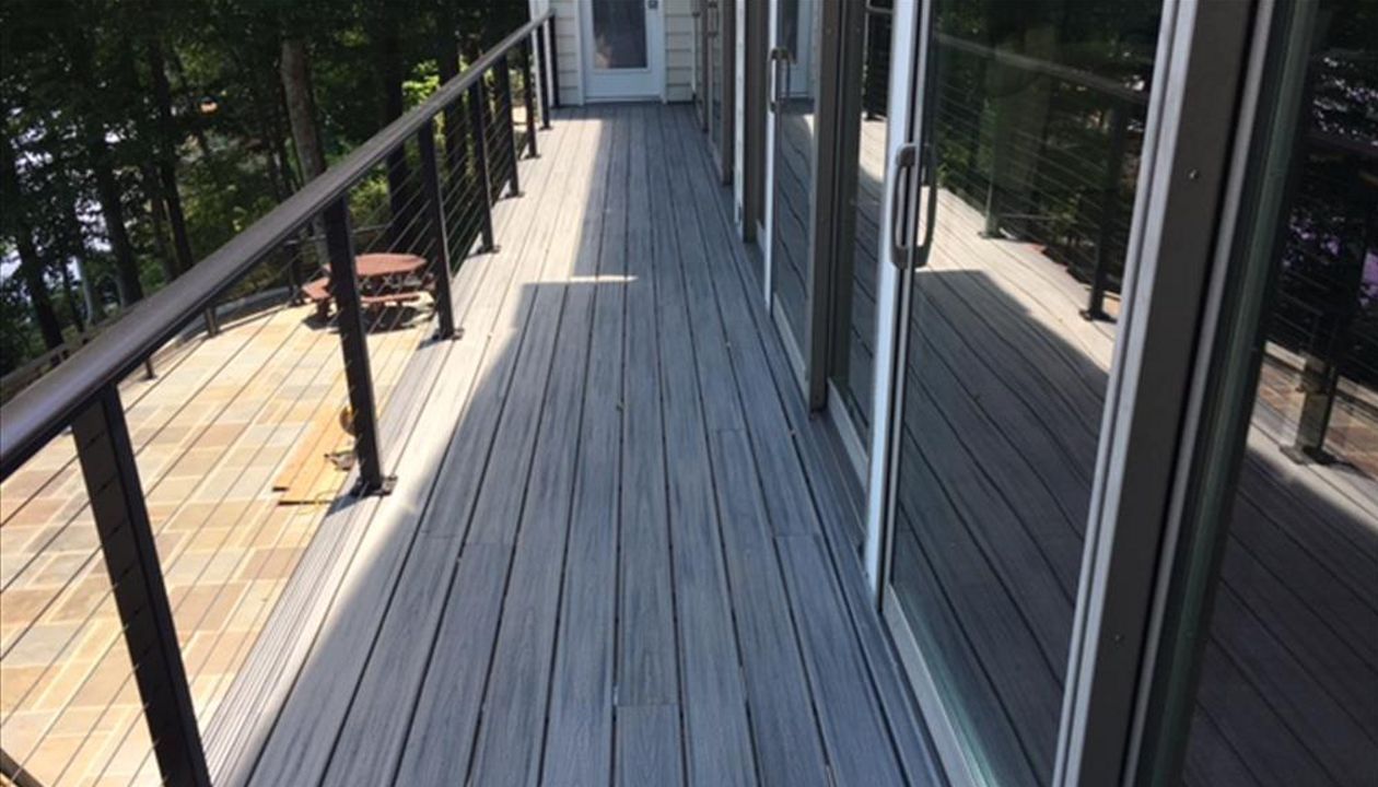 Trex Transcend Island Mist decking looks great with black aluminum cable rails