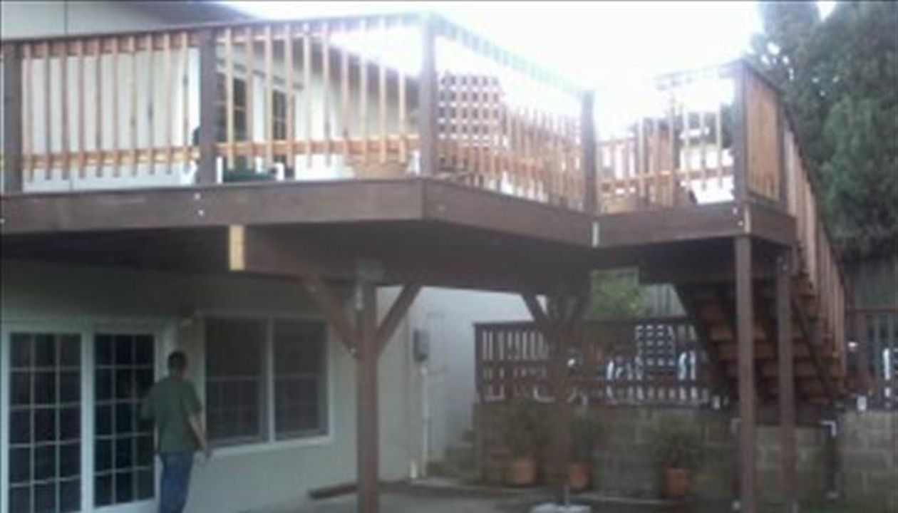 new upper level w/ wood rail and trex cap