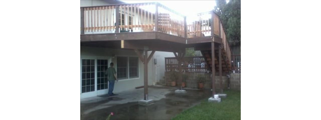 new upper level w/ wood rail and trex cap