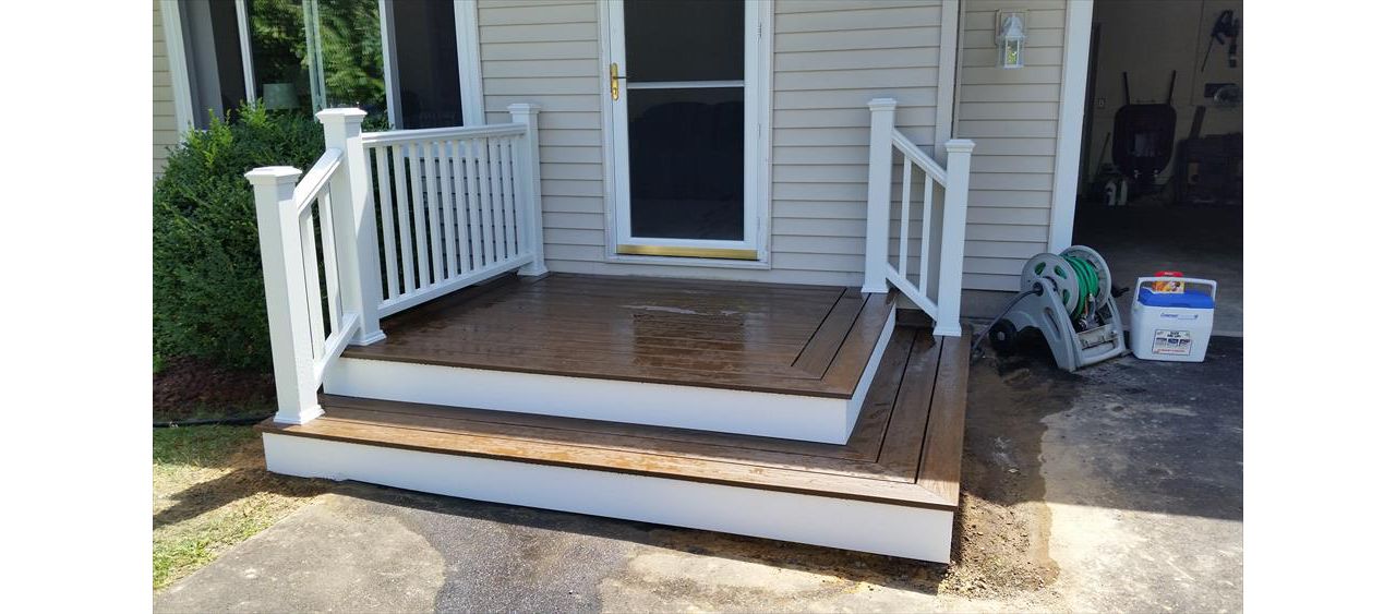 White Trex Transcend railing and composite decking.