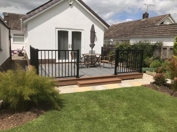 Island Mist with Tikki Torch and Trex Signature railing in black