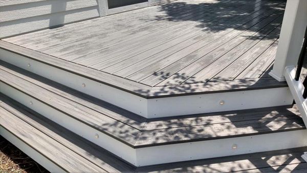 Island Mist decking "picture-framed" using white stair risers and fascia