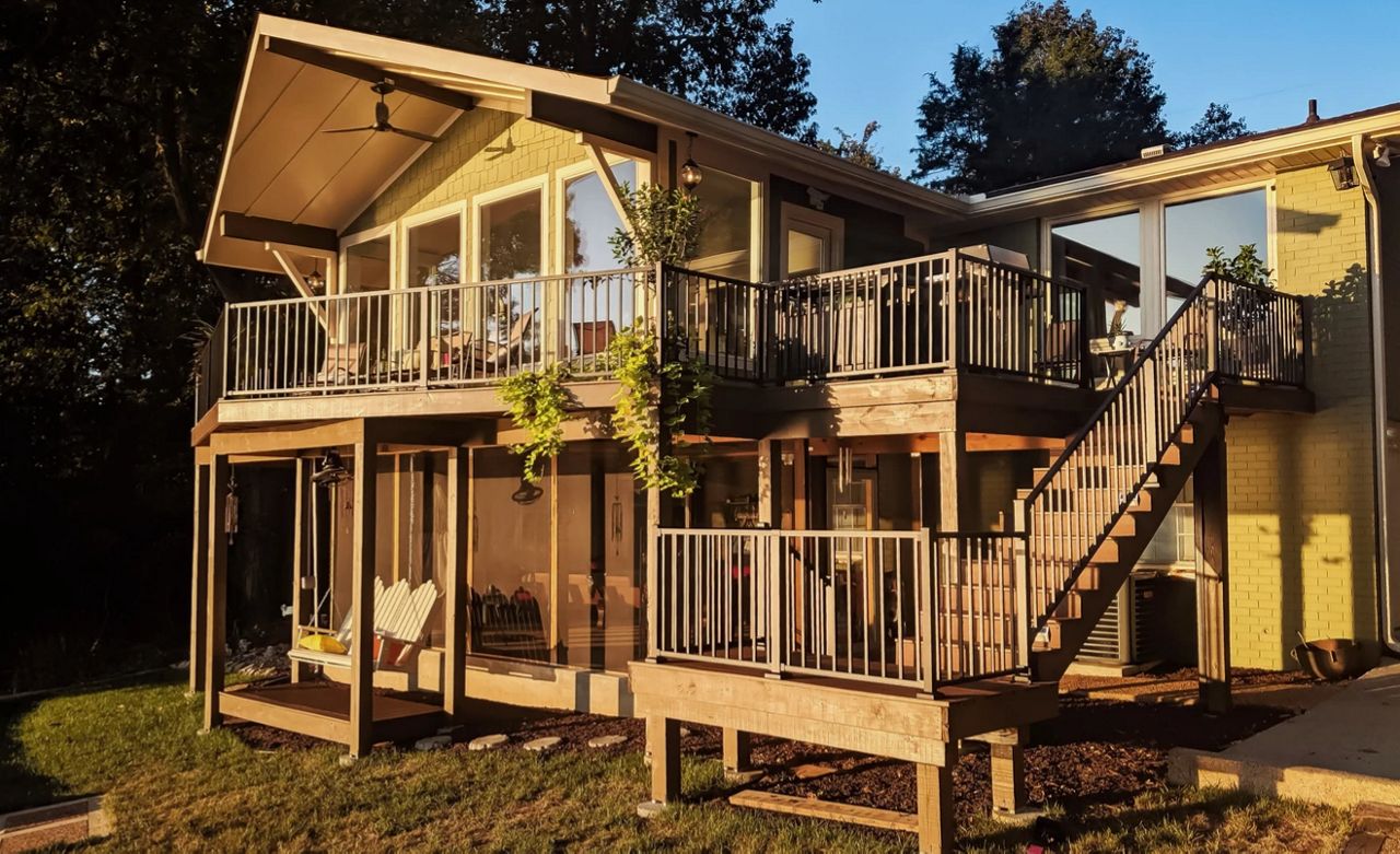 Multi-level Trex deck with screened-in patio below on a lake house in Old Hickory, TN