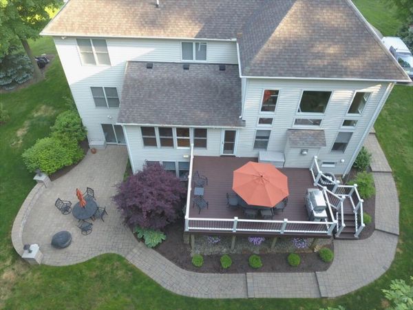 Trex Transcend Lava Rock deck with Trex Transcend white railing.