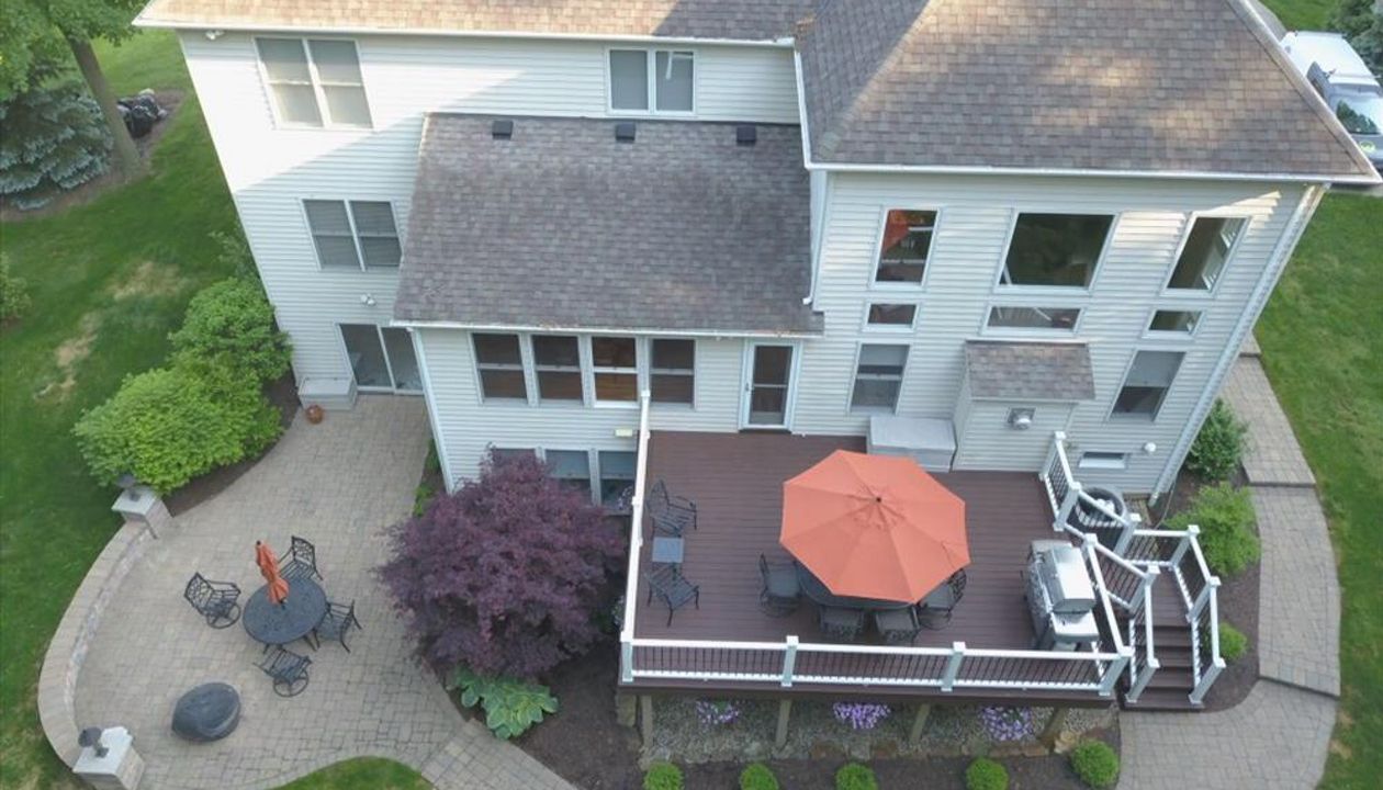 Trex Transcend Lava Rock deck with Trex Transcend white railing.