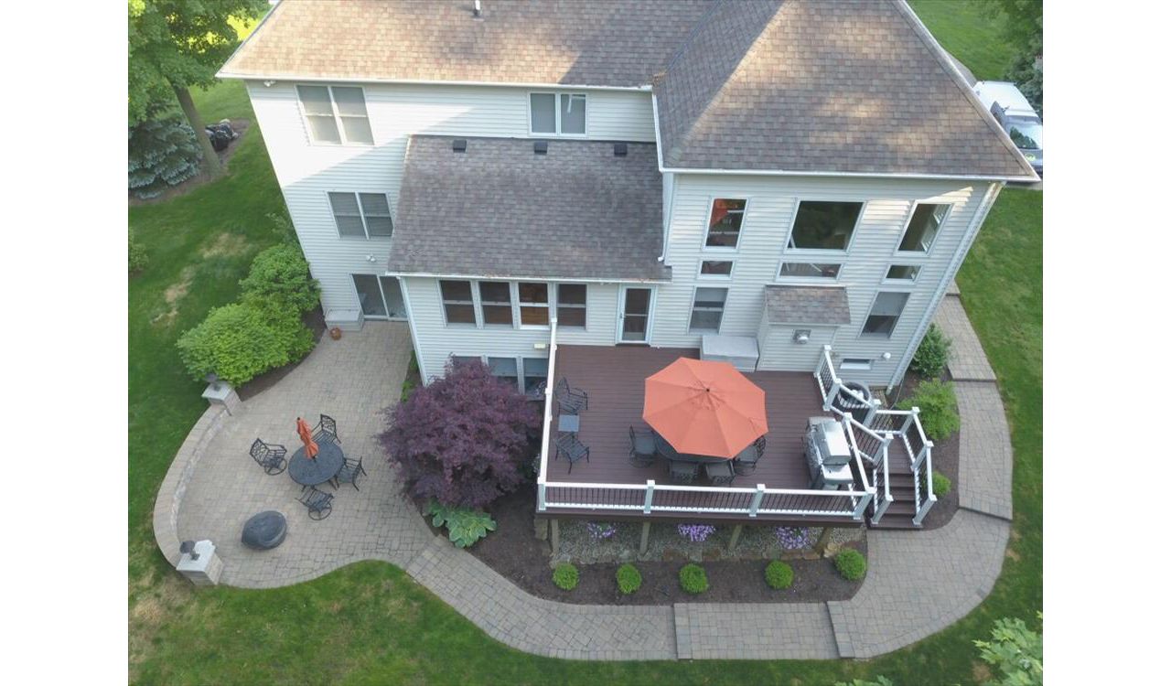 Trex Transcend Lava Rock deck with Trex Transcend white railing.