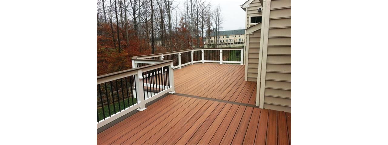 Trex Transcends Tiki Torch composite deck boards w/Spiced Rum feature board
