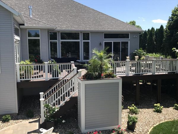 Trex Transcend Tropical Lava Rock Decking Marion Iowas; Trex Transcend White Railing With Large 6x6 Post Sleeves &amp; Lava Rock Colored Top Rail Accents To Match