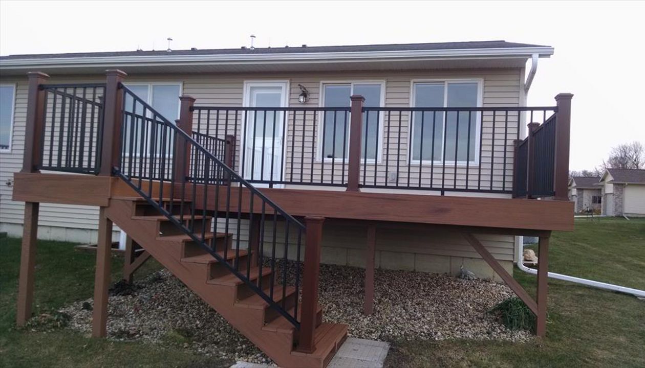 Deck color-Transcend Tropical Lava Rock.  Rails- Aluminum Reveal Charcoal Black.