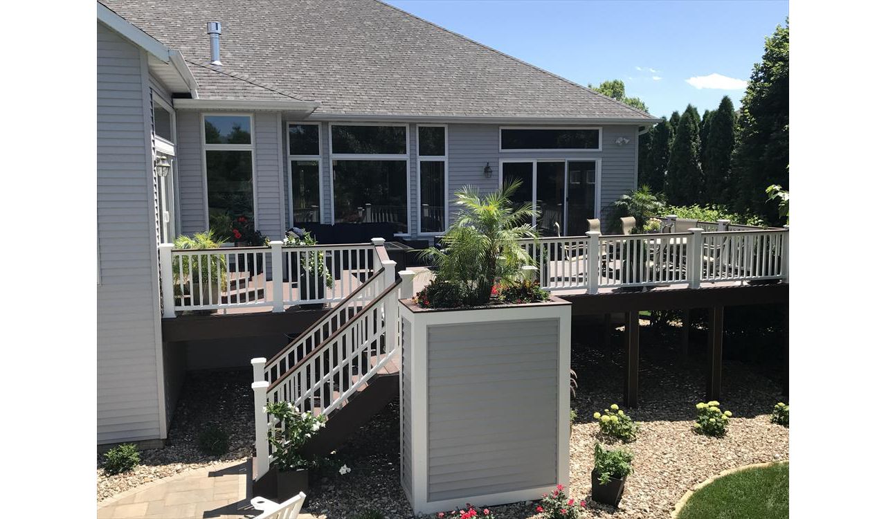 Trex Transcend Tropical Lava Rock Decking Marion Iowas; Trex Transcend White Railing With Large 6x6 Post Sleeves &amp; Lava Rock Colored Top Rail Accents To Match