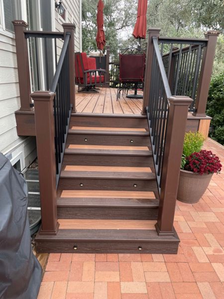 Tiki Torch and Lava Rock picture Frame Stairs in Aurora Colorado