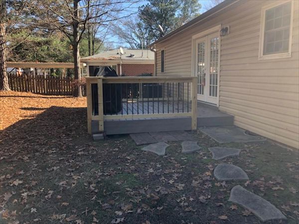 This Trex Enhance Naturals Rocky Harbor deck is finished with Trex Rocky Harbor fascia product.