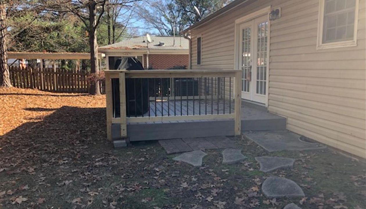 This Trex Enhance Naturals Rocky Harbor deck is finished with Trex Rocky Harbor fascia product.