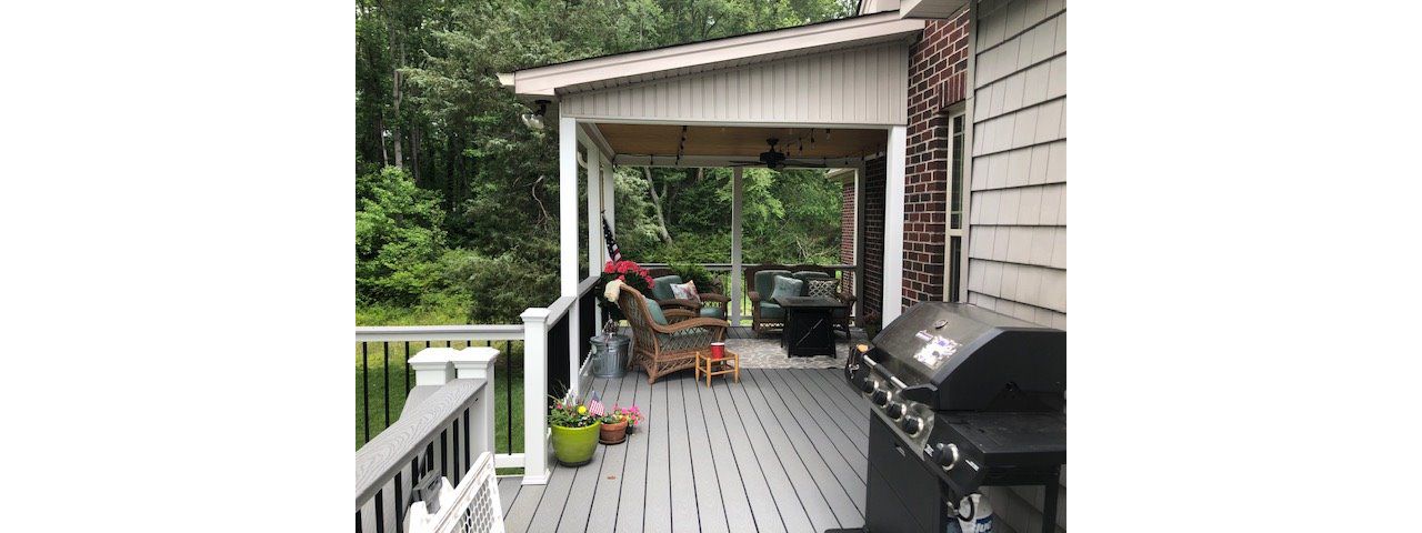 Trex Select Pebble Grey decking with Trex Universal Hideaway fasteners are a wonderful look for this outdoor living space