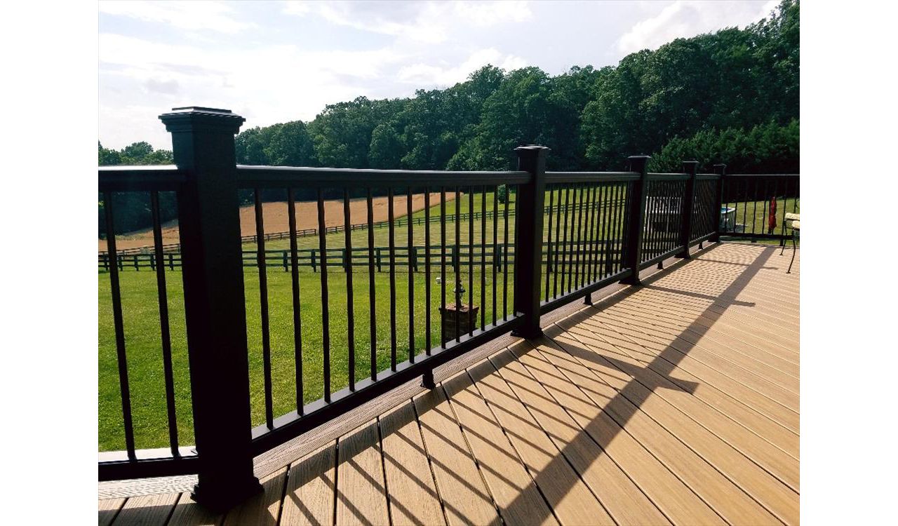 Another look shows off the black Transcend railing with bronze aluminum balusters.