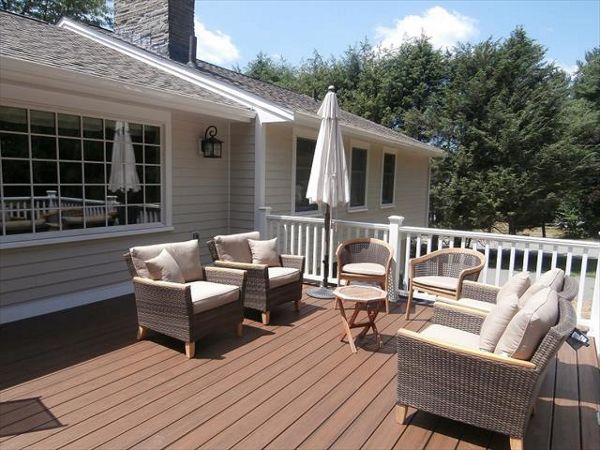 This new Trex Spiced Rum deck and white railing, created a whole new outdoor space that never existed before.