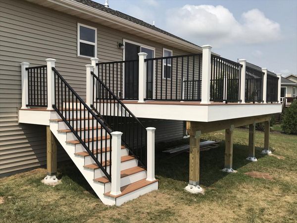 Trex Transcend Tiki Torch with Trex Signature Black aluminum rails by GE Contracting LLC in Greenville, WI