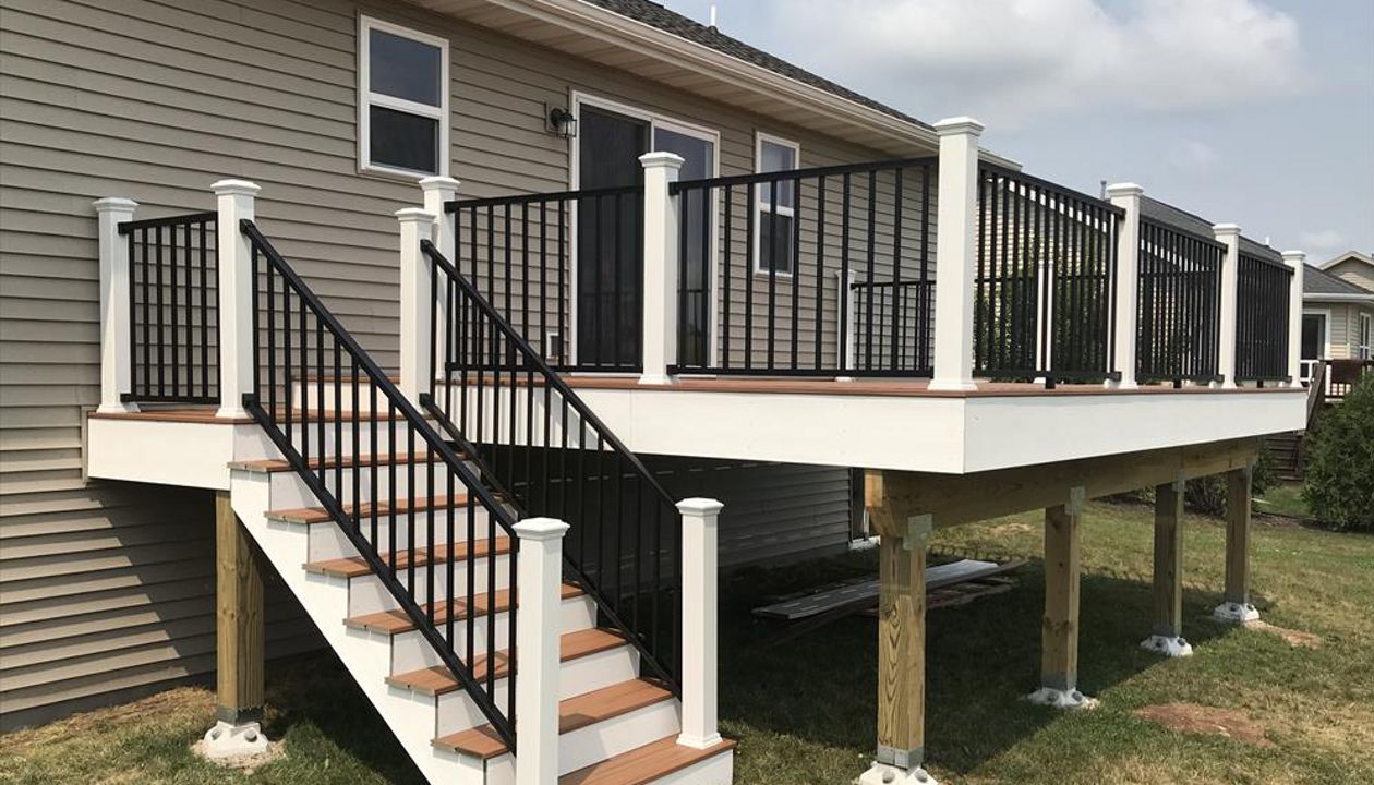 Trex Transcend Tiki Torch with Trex Signature Black aluminum rails by GE Contracting LLC in Greenville, WI