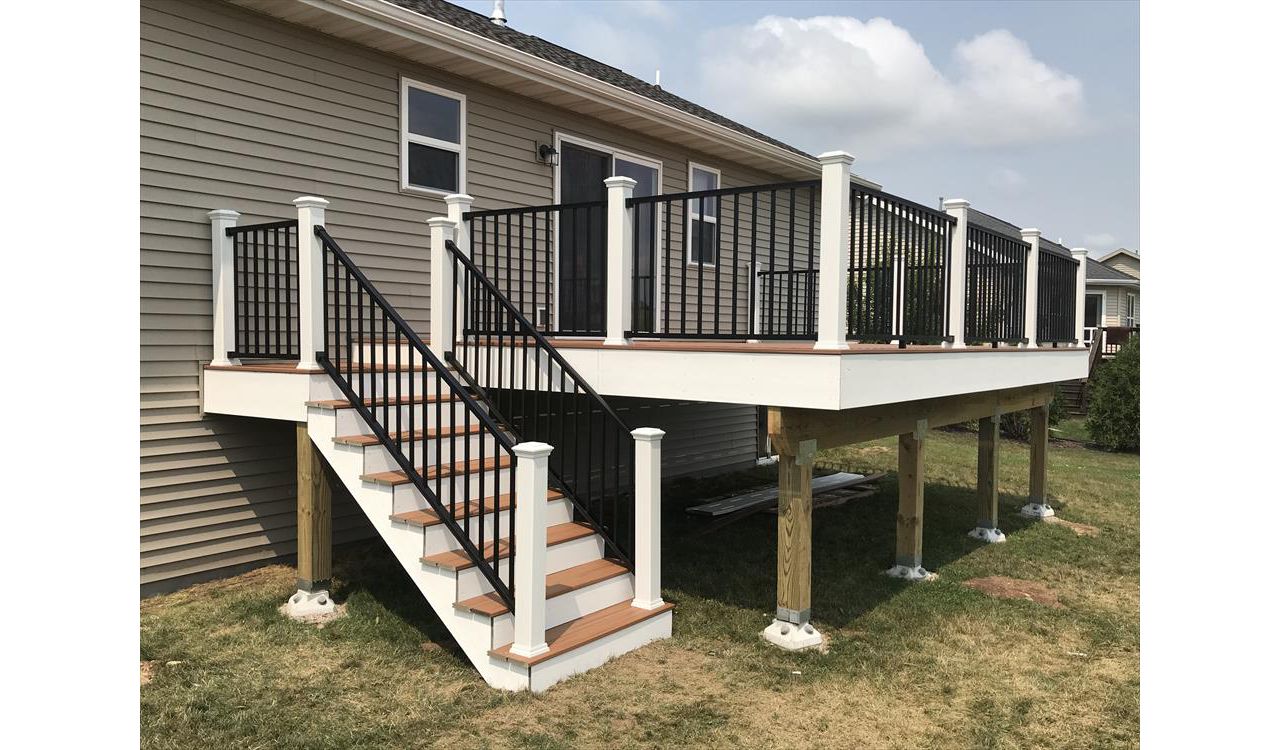 Trex Transcend Tiki Torch with Trex Signature Black aluminum rails by GE Contracting LLC in Greenville, WI