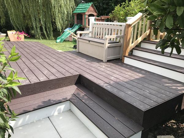 Transition area between ground level deck, entry point, and entrance to the pool deck.