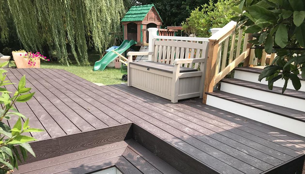 Transition area between ground level deck, entry point, and entrance to the pool deck.