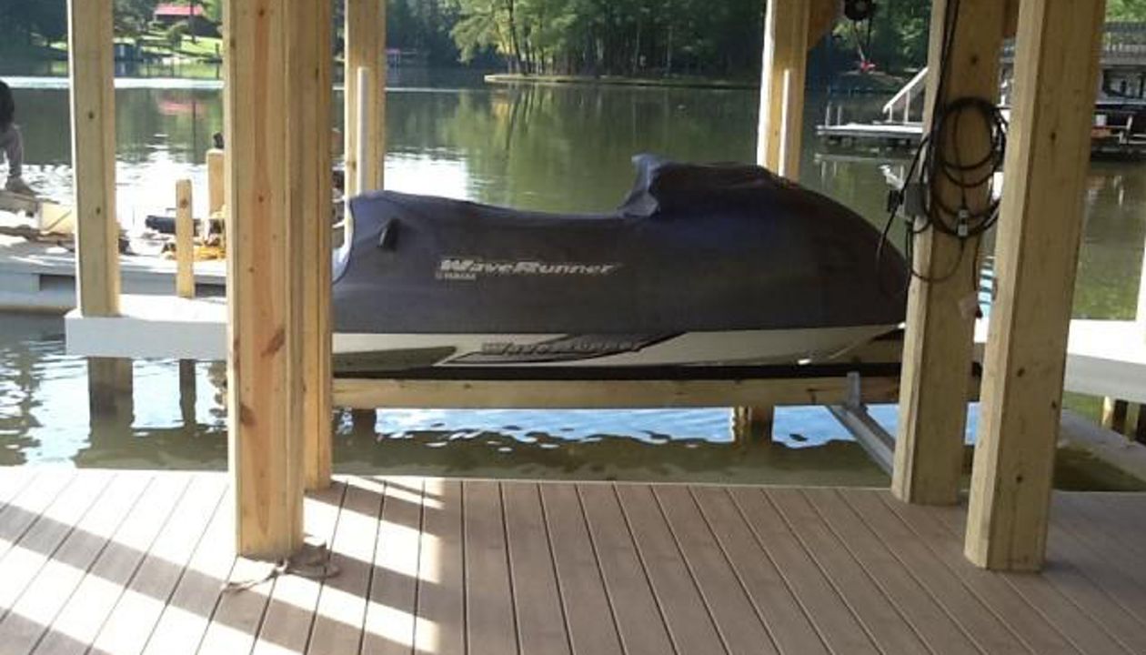 Boathouse has a great area to keep a jet ski or boat