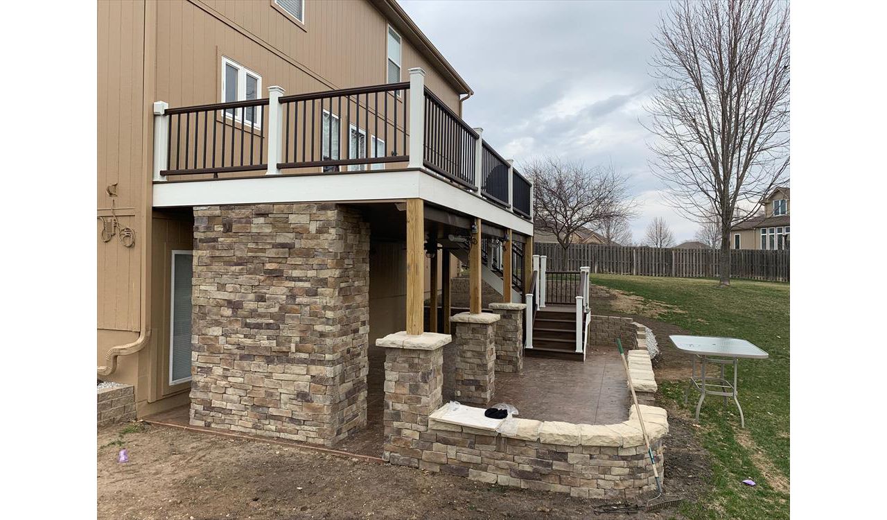 Trex Transcend Tropical (Spiced Rum) Deck with Trex Railing, Fascia and Lights - View from Left side of deck